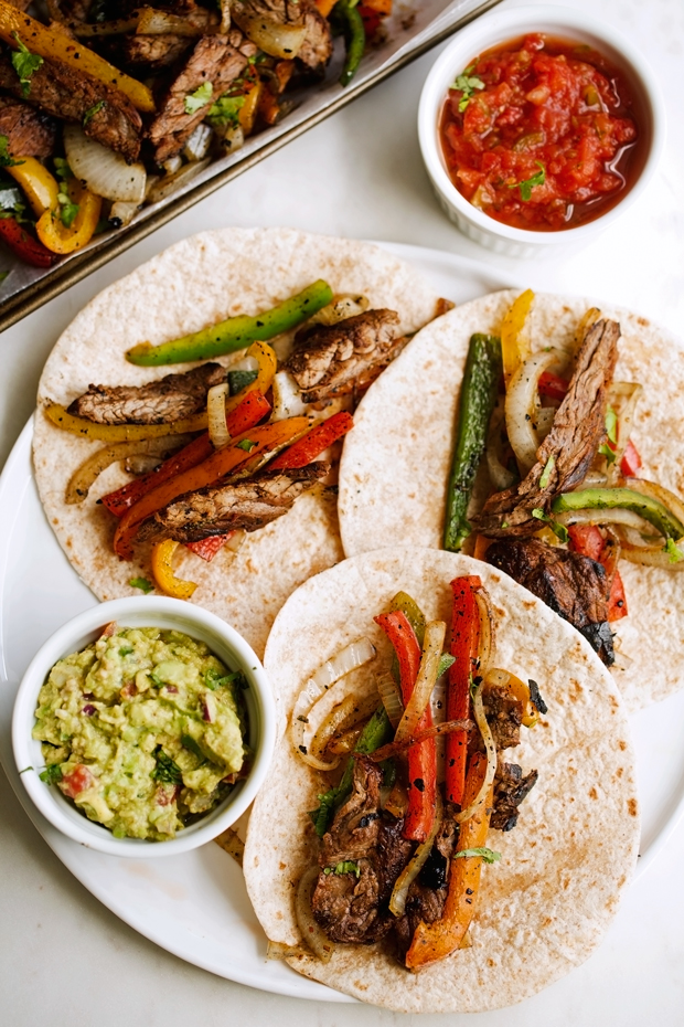 The-BEST-Steak-Fajitas-The BEST Steak Fajitas - made with 1 secret ingredient to make them tender and delicious! BETTER than your favorite restaurants! #steakfajitas #fajitas #bestfajitas #cincodemayo | Littlespicejar.com