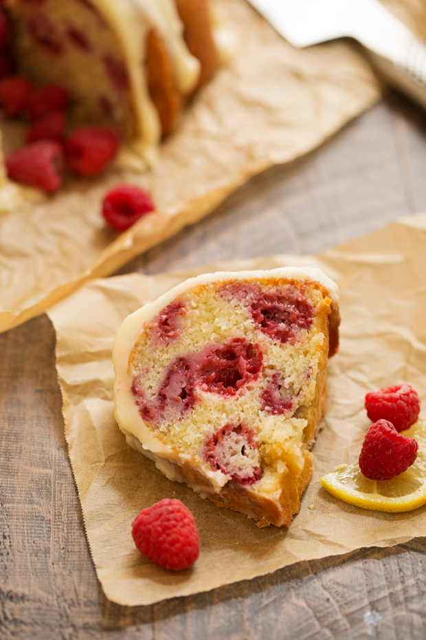 Glazed Lemon Raspberry Bundt Cake - A simple, tender bundt cake with pops of lemon zest and juicy raspberries! #bundtcake #lemonbundtcake #cake #raspberries | Littlespicejar.com