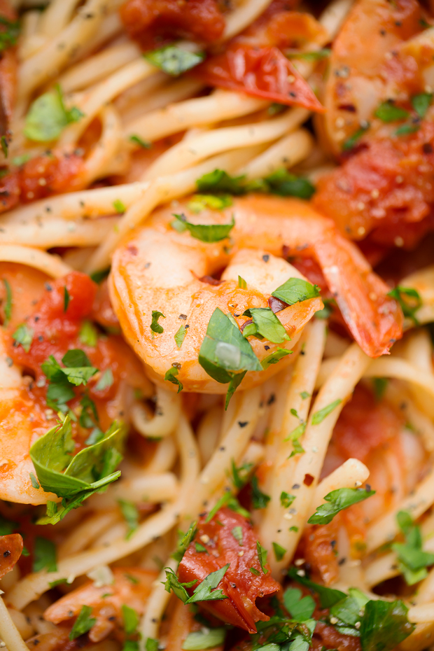 Spicy Shrimp Pasta with Tomatoes and Garlic - A simple pasta dinner with tons of fresh, summery tomatoes and lots of garlic! #pasta #shrimppasta #spicyshrimp #spicyshrimppasta | Littlespicejar.com