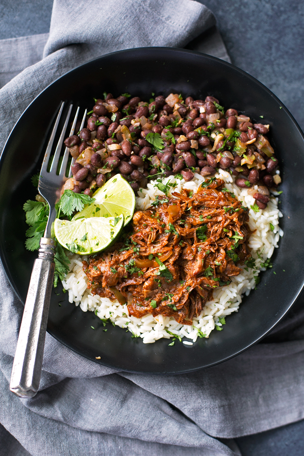 Cuban Black Beans with Cilantro and Lime - These are the perfect accompaniment to white rice and are completely vegan! Slow simmered black beans flavored with cilantro and lime! #cubanblackbeans #frijolesnegros #blackbeans | Littlespicejar.com