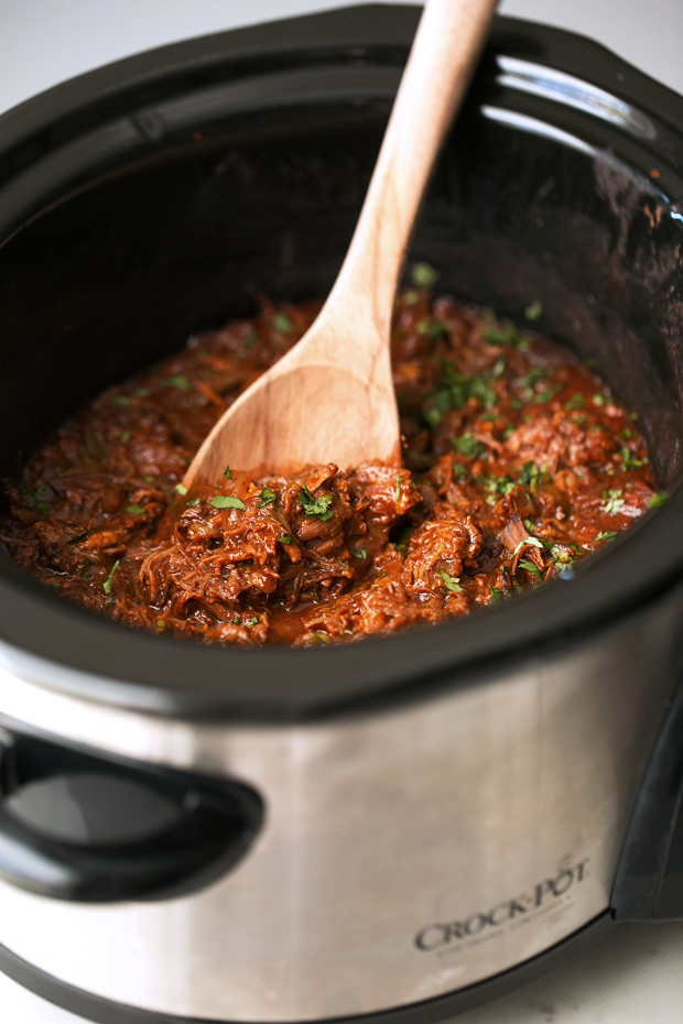 Cuban Shredded Beef (Slow Cooker) - The easiest recipe for ropa vieja! Made in the slow cooker. Just add everything in and out comes the most tender, shredded beef EVER! #cubanshreddedbeef #shreddedbeeftacos #ropavieja #slowcooker | Littlespicejar.com