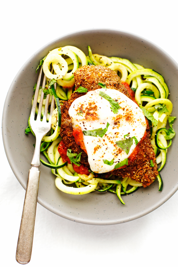 Walnut Crusted Healthy Chicken Parmesan with Zoodles - A healthier take on the chicken parm - we're using walnuts to coat the chicken so it's healthier but still has that crunch! #healthychickenparmesan #walnutcrustedchicken #bakedchicken #chickenparmesan | Littlespicejar.com