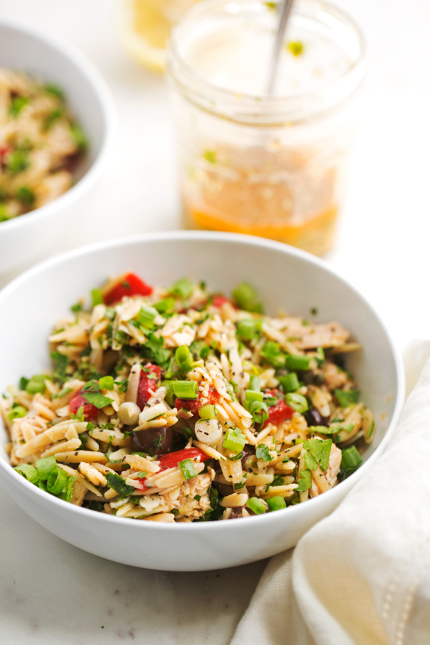 Mediterranean Tuna Orzo Summer Salad - A quick and easy summer salad using mostly pantry ingredients. This salad is hearty and healthy enough to keep you full for hours! Also ideal for #mealprep. #pastasalad #mediterraneansalad #orzosalad #tunasalad | Littlespicejar.com