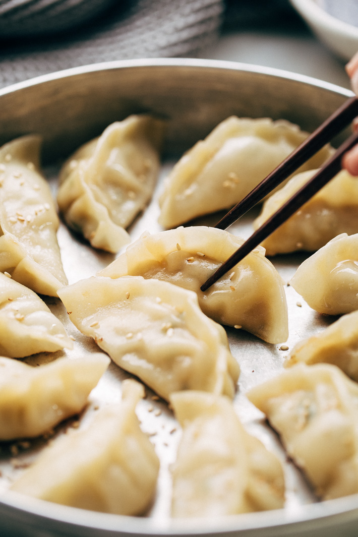 Crazy Good Potstickers with 3-Ingredient Dipping Sauce - The perfect potstickers to make with friends, family, or your significant other on a weekend. The filling is quick and easy to make and these potstickers are so very good! #potstickers #gyoza #jiaozi #wonton | Littlespicejar.com