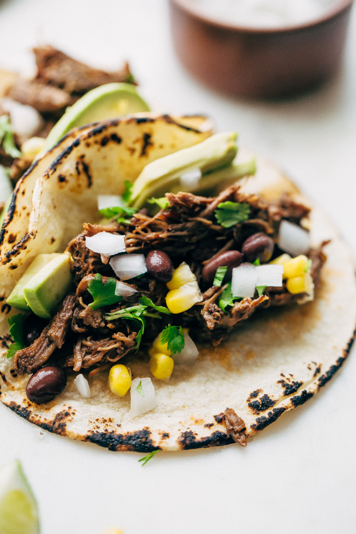 Pressure Cooker Barbacoa Beef - Just sear the meat and pop it all into your pressure cooker and in 1 hour you have the most delicious shredded beef that tastes like you cooked it all day long! #beefbarbacoa #barbacoabeef #instanpot #pressurecooker | Littlespicejar.com