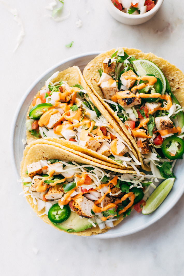 Gotta Have 'Em Ancho Chicken Street Tacos - a simple chicken street taco loaded with all your favorite taco toppings! #anchochickentacos #tacos #streettacos #chickenstreettacos | Littlespicejar.com