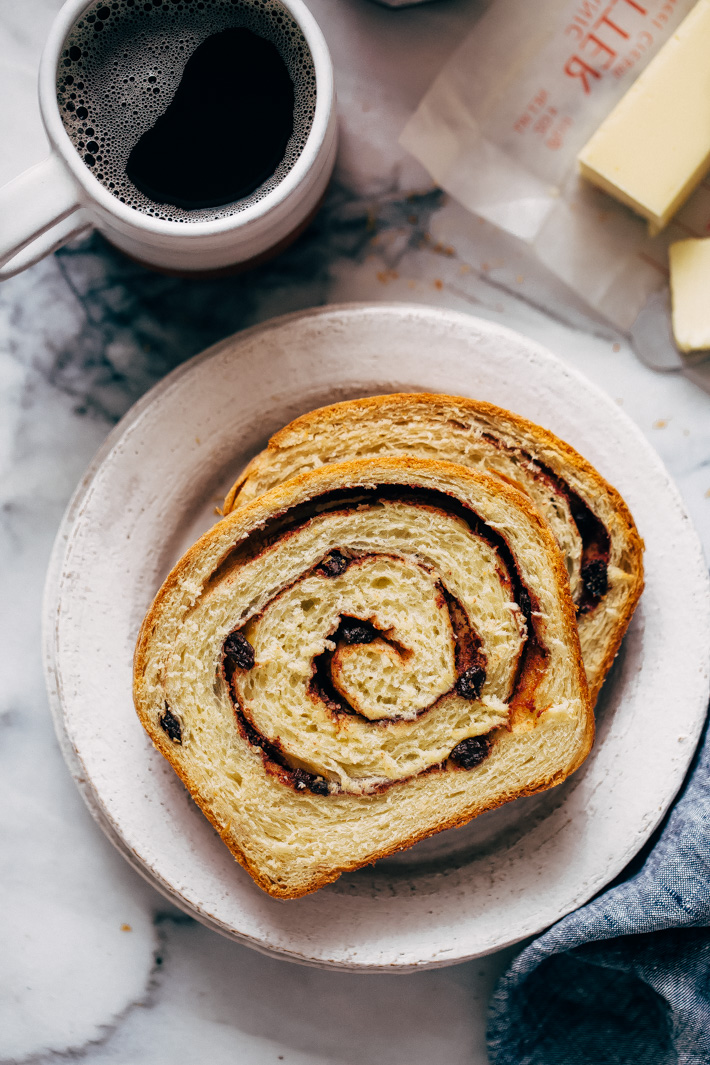 Homemade Cinnamon Swirl Bread - swirls of cinnamon sugar and raisins (or chocolate chips). Perfect to serve smeared with butter or to turn into french toast! #cinnamonbread #cinnamonswirlbread #swirlbread #cinnamonsugarbread | Littlespicejar.com