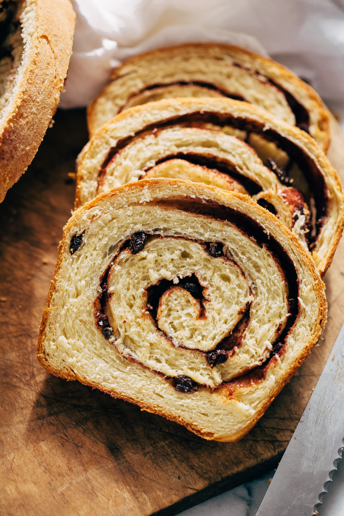 Homemade Cinnamon Swirl Bread - swirls of cinnamon sugar and raisins (or chocolate chips). Perfect to serve smeared with butter or to turn into french toast! #cinnamonbread #cinnamonswirlbread #swirlbread #cinnamonsugarbread | Littlespicejar.com