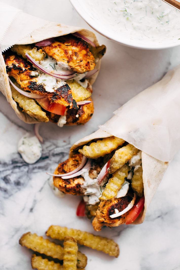 Easy Chicken Gyros with French Fries and Tzatziki Sauce - Learn how to make the easiest chicken gyros! Perfect for weeknight dinners! #chickengyros #gyros #gyrosrecipe #greekchicken | Littlespicejar.com