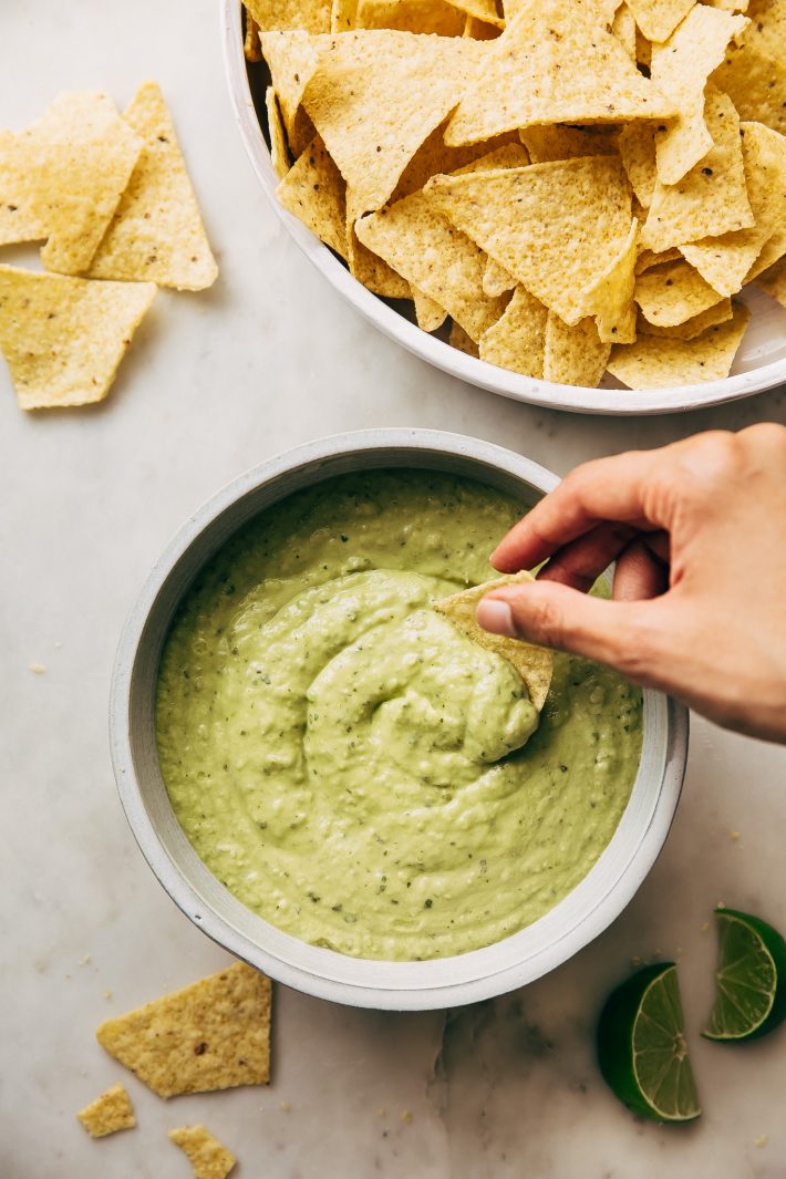 Creamy Guacamole Salsa - An easy avocado dip that tastes just like Mama Ninfa's Green Sauce. Serve with chips or dollop on tacos! #greensauce #mamaninfas #avocadodip #guacamolesalsa | Littlespicejar.com