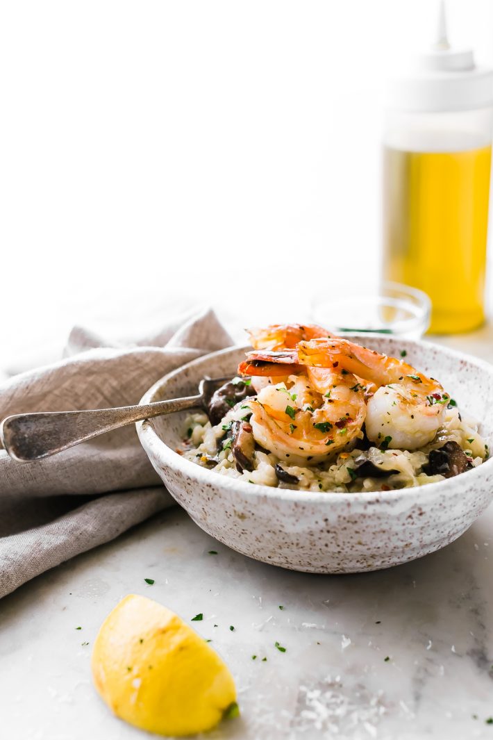 Mushroom Parmesan Shrimp Risotto - Learn how to make shrimp risotto at home with ease! Loaded with sautéed mushrooms, shrimp and tons of garlic! #shrimprisotto #mushroomrisotto #parmesanrisotto #homemaderisotto | Littlespicejar.com