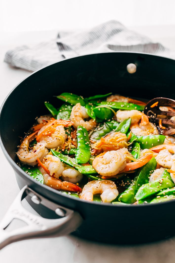 10-Minute Ginger Shrimp Snow Pea Stir Fry - a quick and easy recipe that you can meal prep for the week or put together for dinner tonight! #shrimpstirfry #stirfry #stirfryrecipe #shrimpsnowpeastirfry #quickdinner #dinnerrecipes | Littlespicejar.com