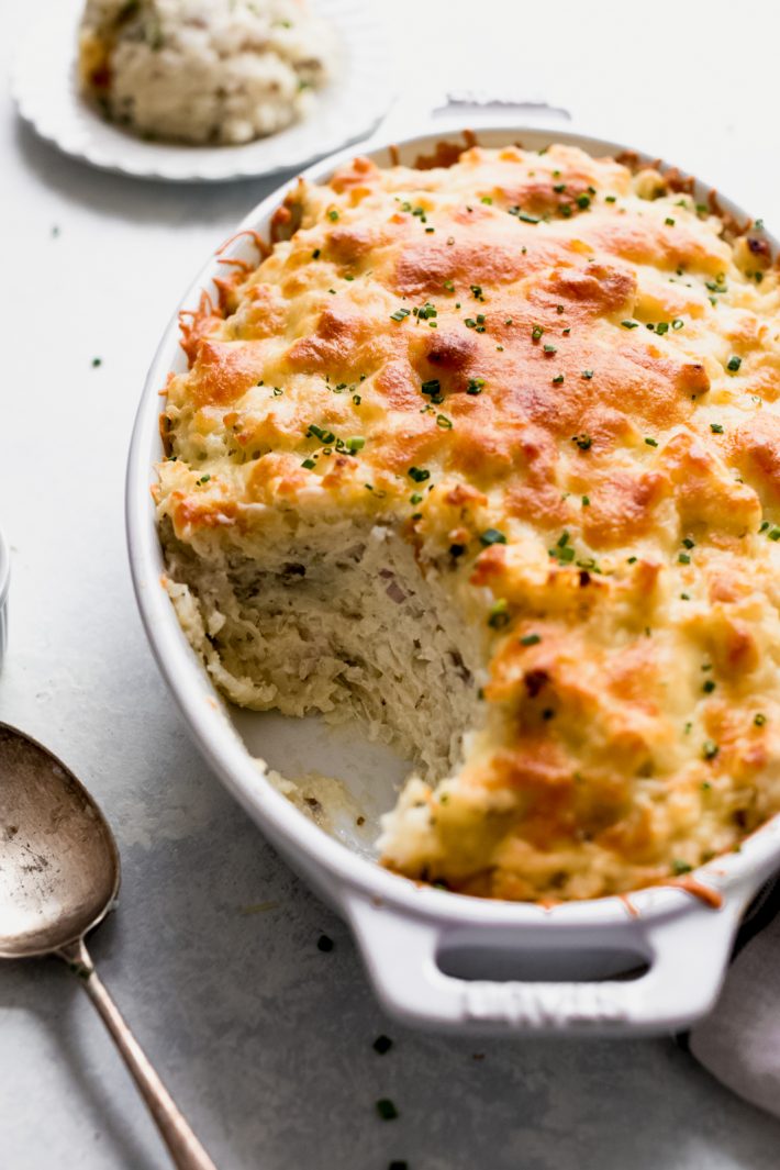 Twice Baked Potato Casserole (Potatoes Romanoff) - Turn regular old baked potatoes into something else special! This is sure to be a hit at Thanksgiving! #potatoesromanoff #twicebakedpotato #twicebakedpotatocasserole | Littlespicejar.com