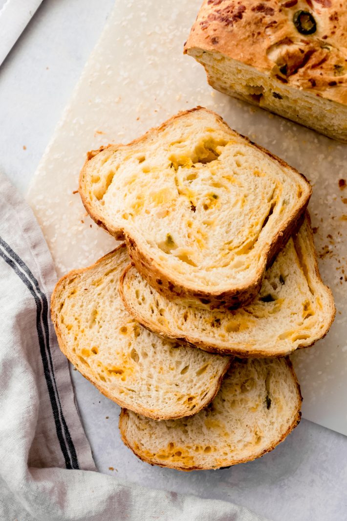 Homemade Jalapeño Cheddar Bread - learn how to turn everyday sandwich bread into something amazing! Use this to make grilled cheese sandwiches, serve with chili, or tomato soup, or make gourmet sandwiches! #cheddarcheesebread #cheesebread #jalapenocheddarbread #sandwichbread #breadrecipe | Littlespicejar.com