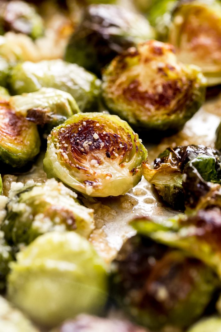 Garlic Butter Brussels Sprouts - my favorite, easy side dish that doesn't require a ton of ingredients but tastes so so good! You could make a meal out of this stuff! #roastedbrusselssprouts #brusselssprouts #sidedish #thanksgivingrecipes #vegetarian #roasted | Littlespicejar.com