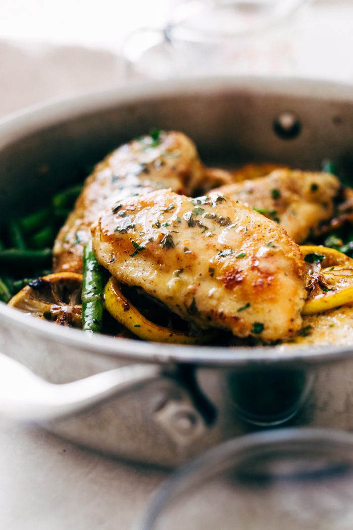 Skillet Garlic Lemon Butter Chicken - an easy chicken recipe with green beans and drizzled in a quick and easy garlic lemon butter sauce! #chickenrecipes #easydinner #lemongarlicchicken #chickendinner #skilletchicken | Littlespicejar.com