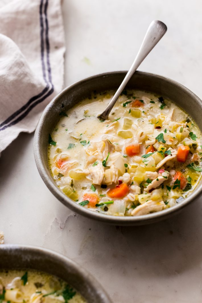 Winter Lemon Chicken Barley Soup - An irresistible creamy lemon chicken barley soup that has tons of veggies, tender barley and is hearty and comforting for chilly winter days! #chickenbarleysoup #chickensoup #soup #lemonsoup | Littlespicejar.com