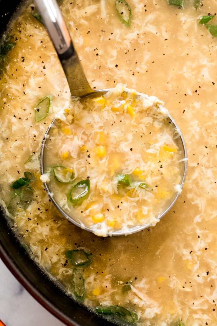 Comforting Chicken Corn Soup - a mashup of chicken soup and egg drop soup! It's warm and hearty and so comforting for when you're feeling under the weather! #chickencornsoup #chickensoup #eggdropsoup #soup #easyrecipes #souprecipe | Littlespicejar.com