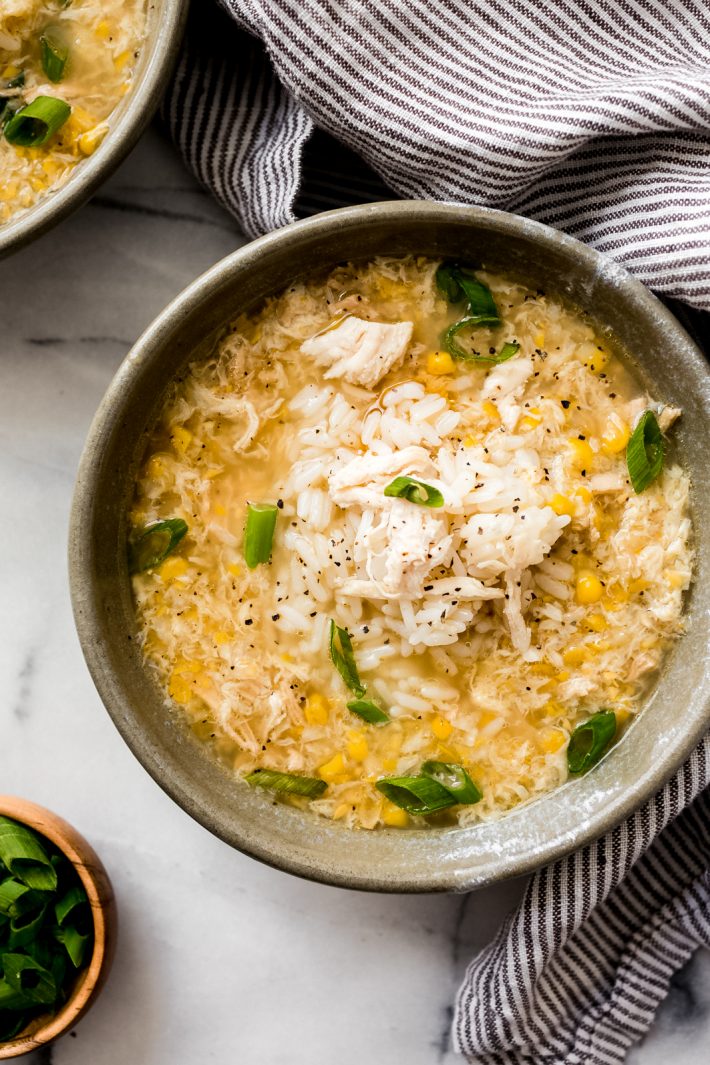 Comforting Chicken Corn Soup - a mashup of chicken soup and egg drop soup! It's warm and hearty and so comforting for when you're feeling under the weather! #chickencornsoup #chickensoup #eggdropsoup #soup #easyrecipes #souprecipe | Littlespicejar.com