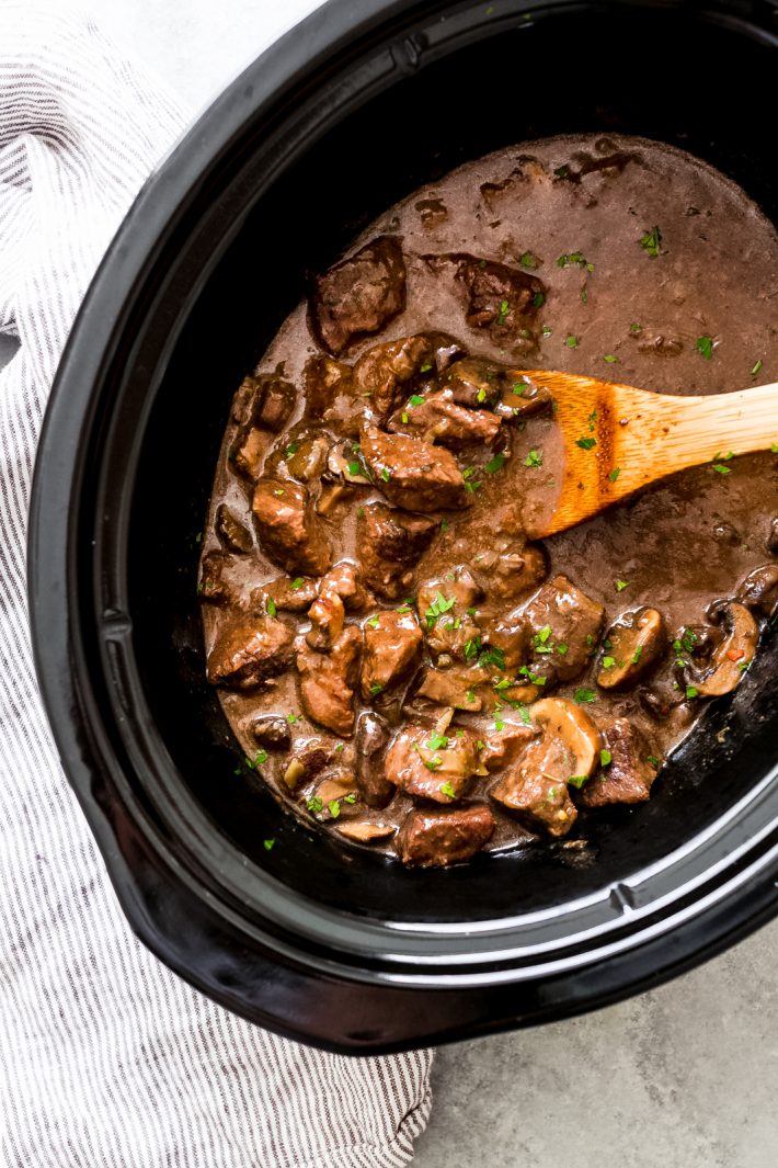 Ridiculously Tender Beef Tips with Mushroom Gravy - Easy beef tips in mushroom gravy that you can make in the instant pot or the slow cooker! This recipe is sure to be a hit with your entire family! #beeftips #beeftipsandmushroomgravy #beefstew #instanpotrecipe #instantpot #slowcooker #slowcookerbeeftips | Littlespicejar.com