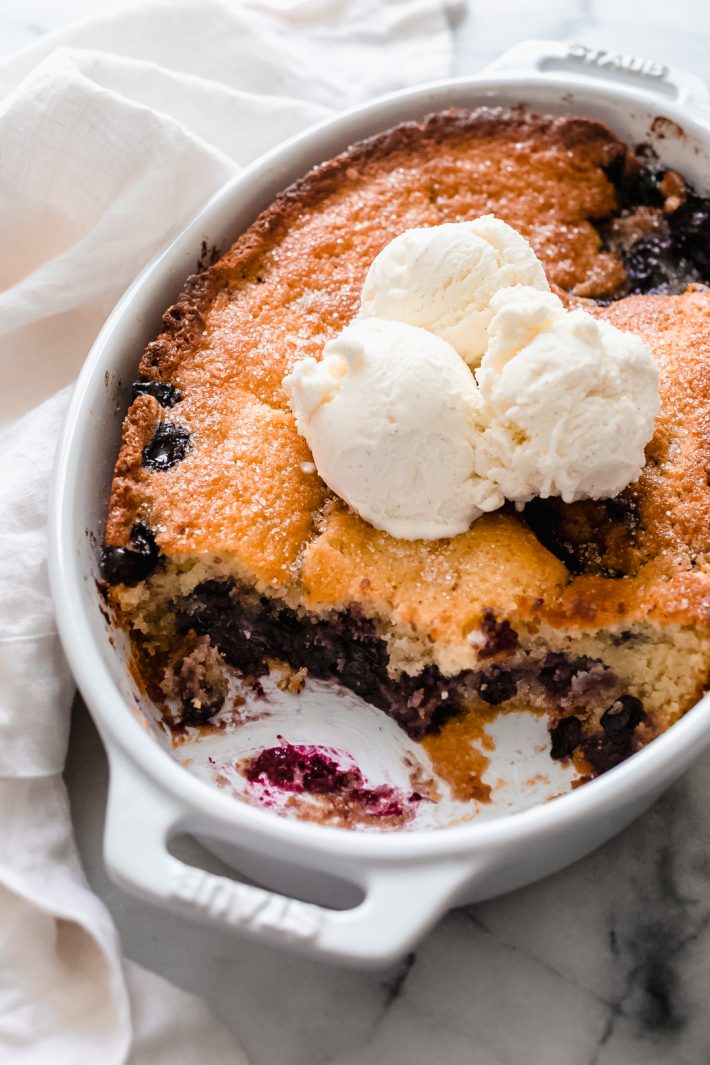 Easy Texas Blueberry Cobbler - Learn how to make the easiest blueberry cobbler that takes just 10 minutes to prep and you only need 10 ingredients! #easydesserts #cobbler #easycobbler #dessert #dessertrecipe #easterdesserts #warmdesserts #blueberrycobbler #texascobbler | Littlespicejar.com