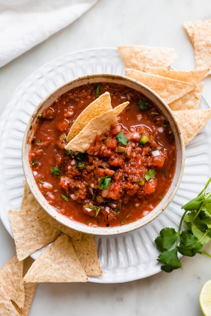 5-Minute Blender Salsa (Restaurant Style) - The perfect recipe to make for Cinco de Mayo and its really easy! Just toss it all in the blender or food processor! #blendersalsa #salsaroja #5minutesalsa #salsarecipe #restaurantstylesalsa #homemadesalsa | Littlespicejar.com
