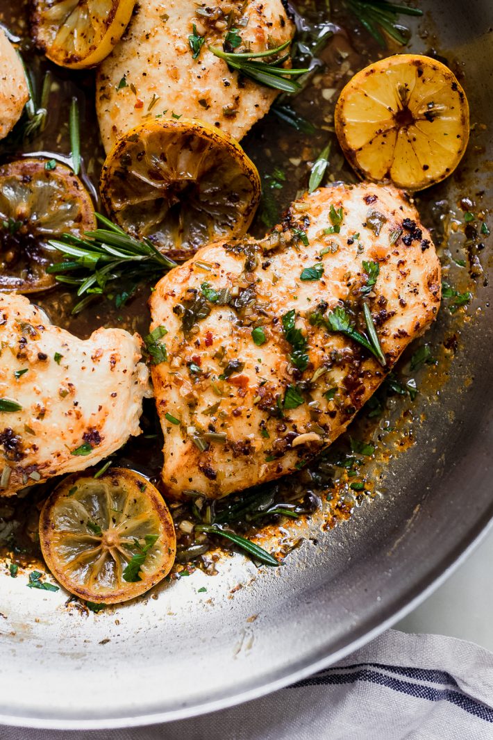 Easy Lemon Rosemary Chicken - Learn how to make a simple, weeknight friendly chicken dinner! Just 10 simple ingredients and it comes with pan sauce for your sides! #lemonchicken #lemonrosemarychicken #chickendinner #easyrecipes #chickenrecipes #dinnerideas | Littlespicejar.com