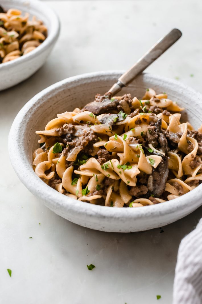 30-Minute Skillet Ground Beef Stroganoff - loaded with lots of flavor, this ground beef stroganoff is ready in 30 minutes and is sure to be a crowd pleaser! #stroganoff #onepotstroganoff #skilletstroganoff #groundbeefstroganoff #onepot #onepan #dinner | Littlespicejar.com