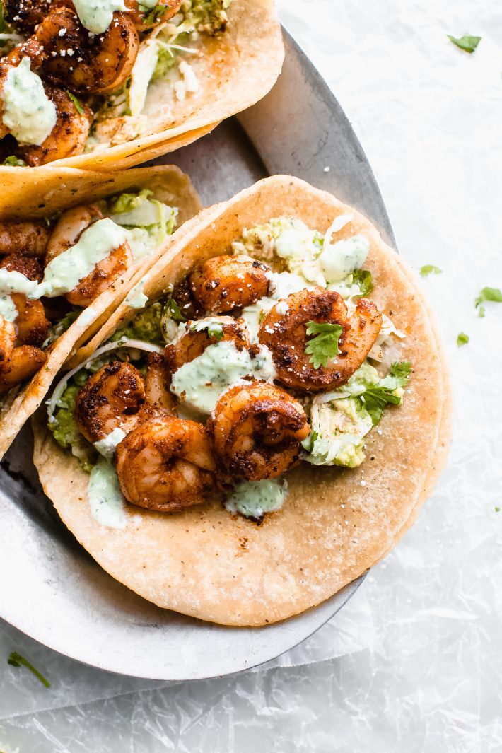 Blackened Shrimp Tacos with Smashed Avocados and Slaw - homemade blackened seasoning and these tacos are ready in less than 30 minutes! #blackenedshrimp #shrimptacos #tacos #tacotuesday #tacorecipe | Littlespicejar.com