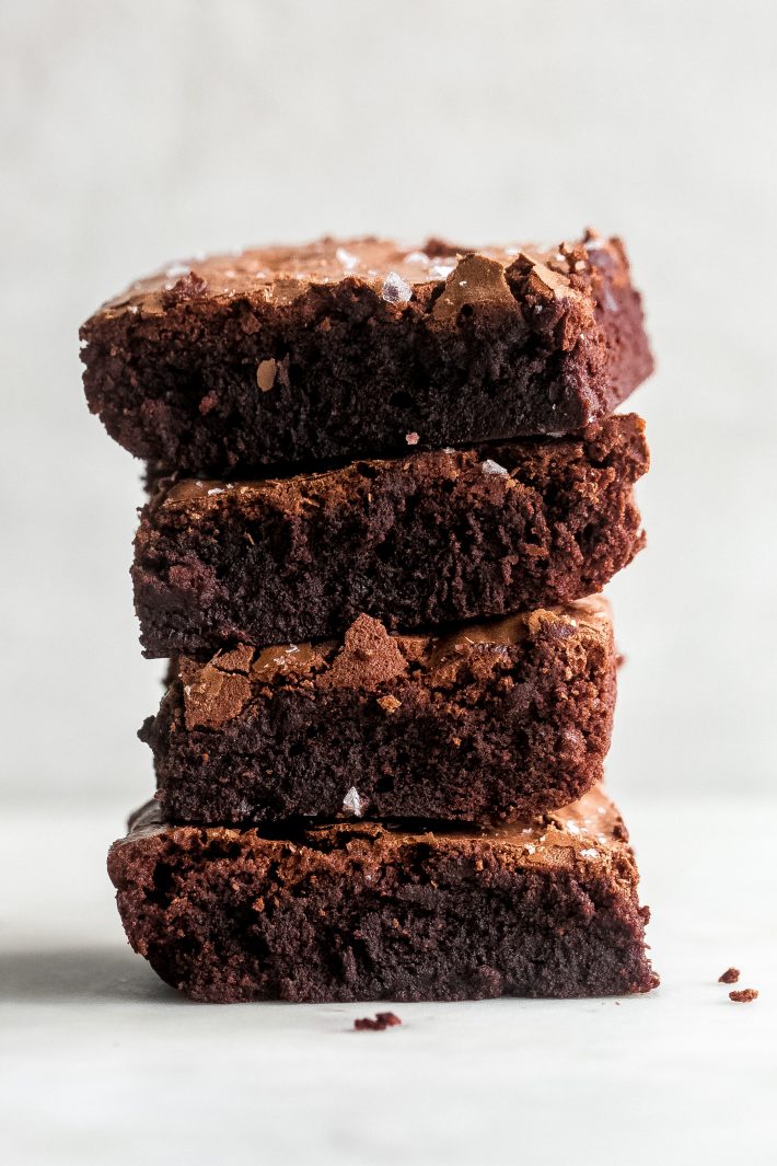 Pan-Banging Salted Fudge Brownies - These brownies are the most delicious intense fudge brownies ever! They contain no leavening agents and create the best better-than-box-mix, from-scratch brownies! #brownies #fudgebrownies #bestbrownies #browniesrecipe #bestfudgebrownies | Littlespicejar.com