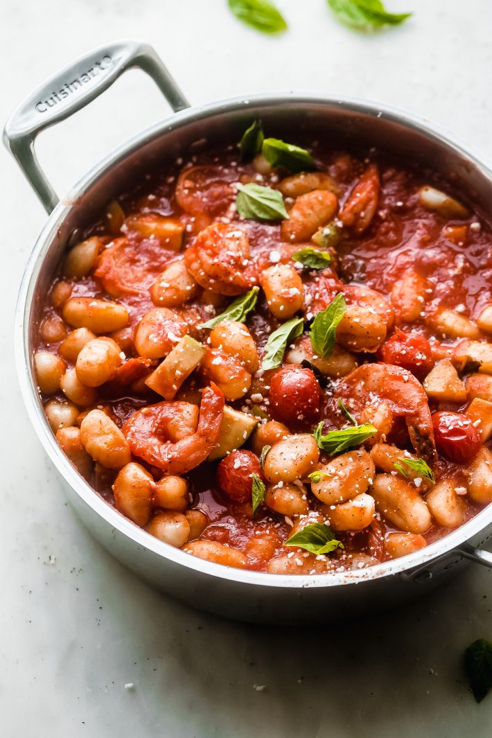 Shrimp Gnocchi in Pomodoro Sauce - an easy summer meal that has zucchini, Pomodoro sauce, gnocchi, cherry tomatoes, and shrimp! It's summer comfort food! #pomodorosauce #gnocchi #gnocchipomodoro #shrimpwithgnocchi #tomatosauce #onepotmeal | Littlespicejar.com