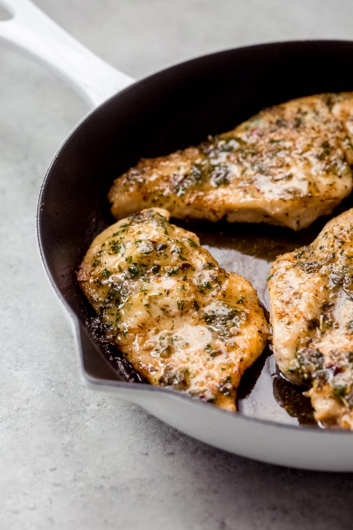 Garlic Butter Baked Chicken Breasts - The easiest way to roast chicken breasts are you can use them with salads, in pasta, or even on the side with mashed potatoes and roasted veggies! #easychickendinners #chickendinner #chickenrecipes #easychickenrecipes #garlicbutterbakedchicken #bakedchicken | Littlespicejar.com