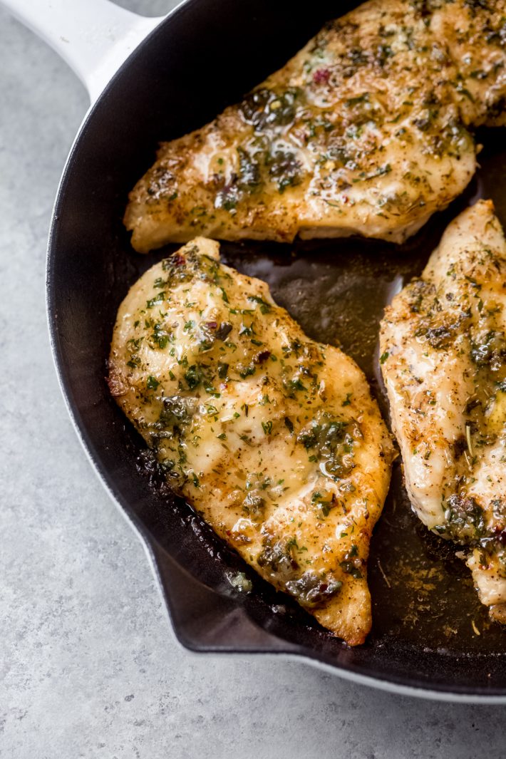 Garlic Butter Baked Chicken Breasts - The easiest way to roast chicken breasts are you can use them with salads, in pasta, or even on the side with mashed potatoes and roasted veggies! #easychickendinners #chickendinner #chickenrecipes #easychickenrecipes #garlicbutterbakedchicken #bakedchicken | Littlespicejar.com