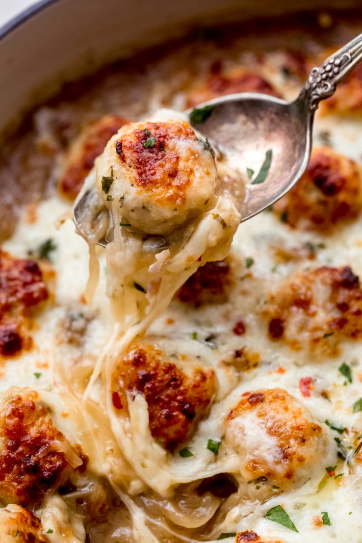 French onion chicken meatballs on a spoon