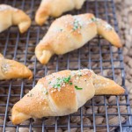 Garlic and Parmesan Crescents with Jalapeno Cream Cheese Ready On Wire Rack
