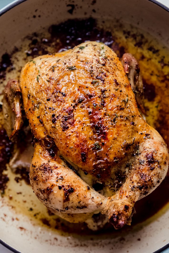 whole roasted chicken in cast iron pan