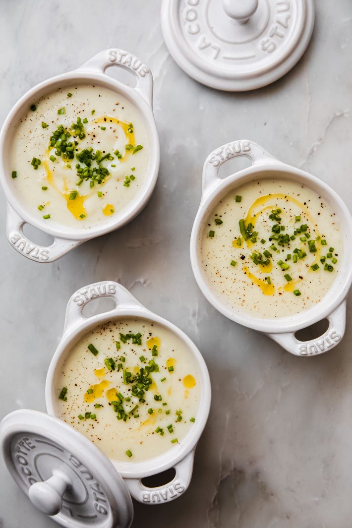 mini dishes with potato soup topped with chives