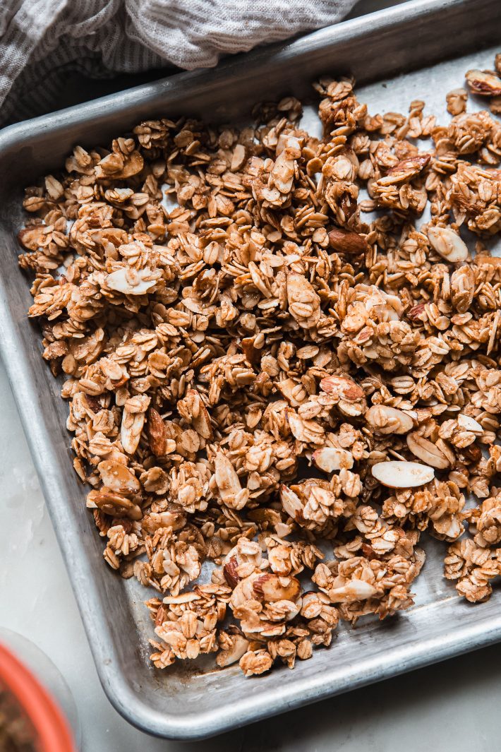 sheet pan with granola showing almond slices