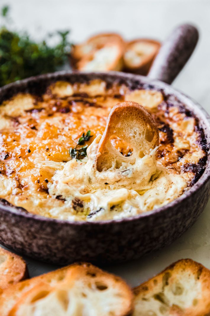 toasted bread in dip