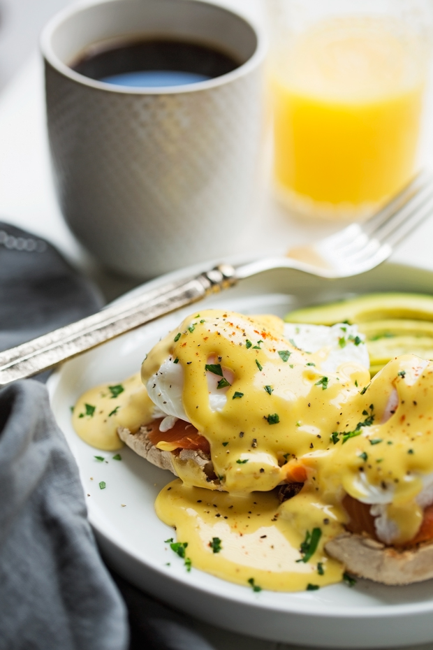 Blender Hollandaise Sauce with Eggs Benedict - learn how to make EASY and perfect hollandaise sauce every single time! #blenderhollandaisesauce #hollandaisesauce #poachedeggs #eggsbenedict | Littlespicejar.com