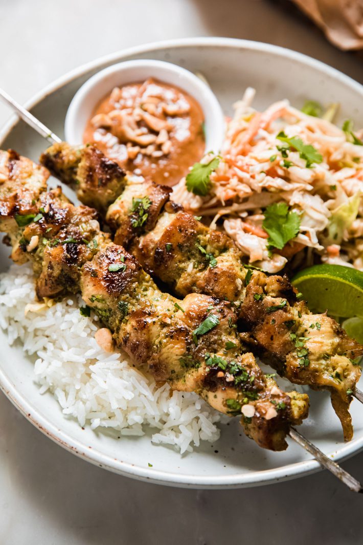chicken satay over rice with peanut lime slaw