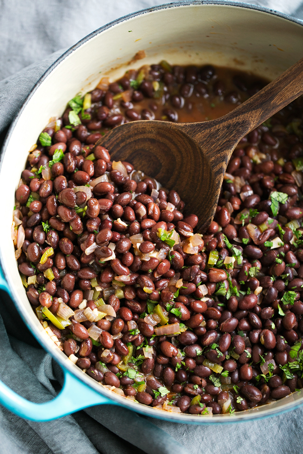 Cuban Black Beans with Cilantro and Lime - These are the perfect accompaniment to white rice and are completely vegan! Slow simmered black beans flavored with cilantro and lime! #cubanblackbeans #frijolesnegros #blackbeans | Littlespicejar.com