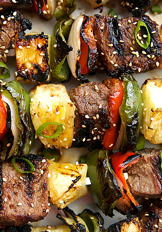 Korean Beef Kabobs (Bulgogi) An easy recipe to make when entertaining or for summertime grilling! Just marinade the meat and make the skewers! So EASY and SOOOOO delicious! #bulgogi #bulgogibeef #koreanbbq #koreanbeef #kabobs | Littlespicejar.com
