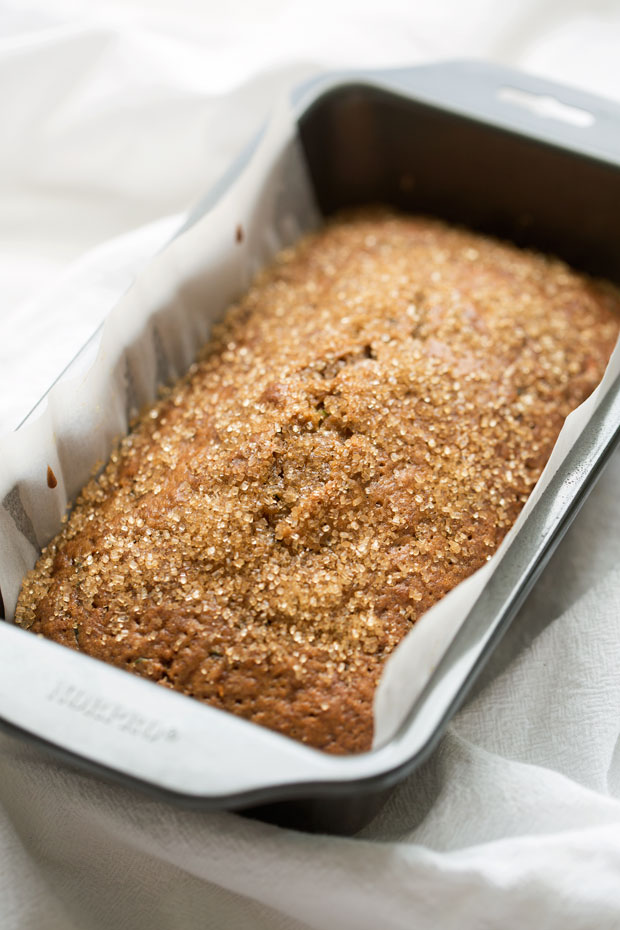 Autumn Spiced Zucchini bread -- made with warm spiced and topped with a crunchy sugar topping. The most delicious loaf you'll make this fall! #zucchinibread #zucchiniloaf #spicedbread | Littlespicejar.com