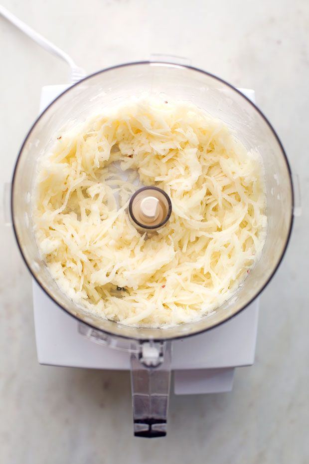 shredded potatoes in the food processor
