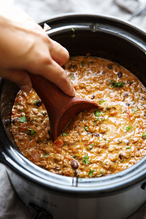 The BEST Cheesy Chili Dip - made with a homemade taco seasoning and NO Velveeta - just simple homemade cheese sauce! So good! #chilicheesedip #cheesychilidip #chilidip | Littlespicejar.com