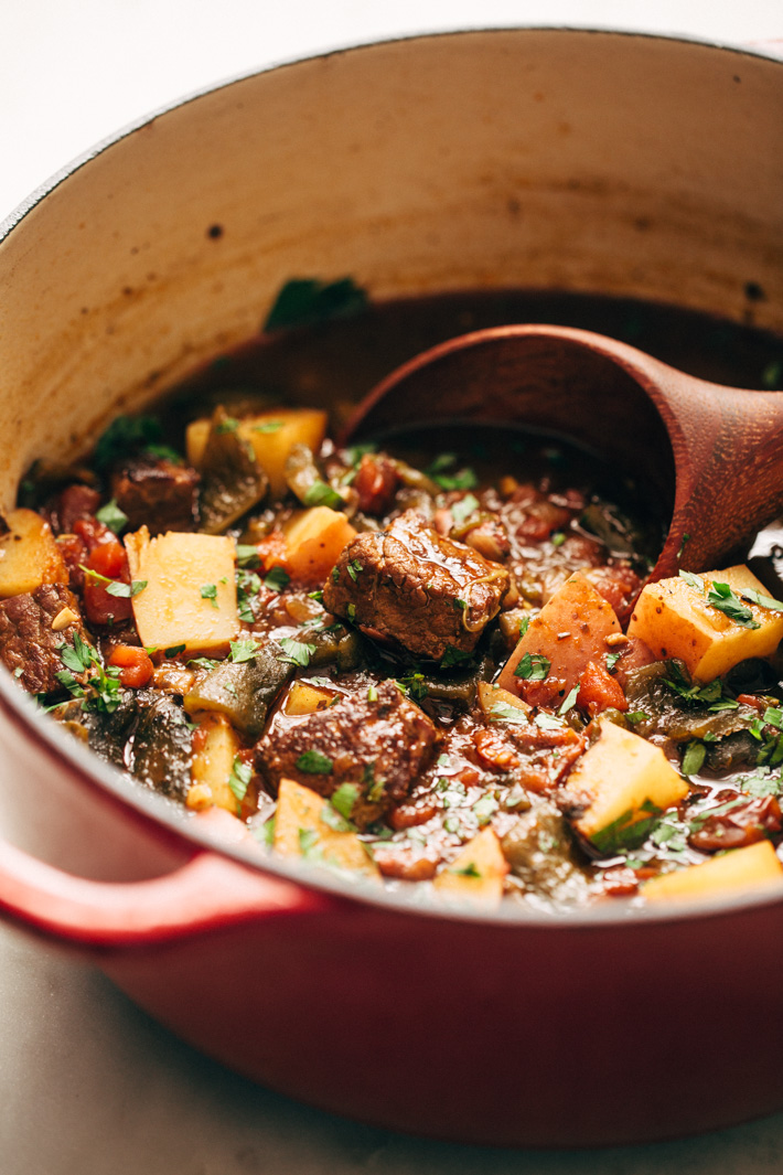 Hearty Poblano Beef Stew - a beef stew that's been amped up with roasted poblanos and chipotle peppers! So good you'll forget about your old stew recipe! #beefstew #stew #poblanobeefstew | Littlespicejar.com