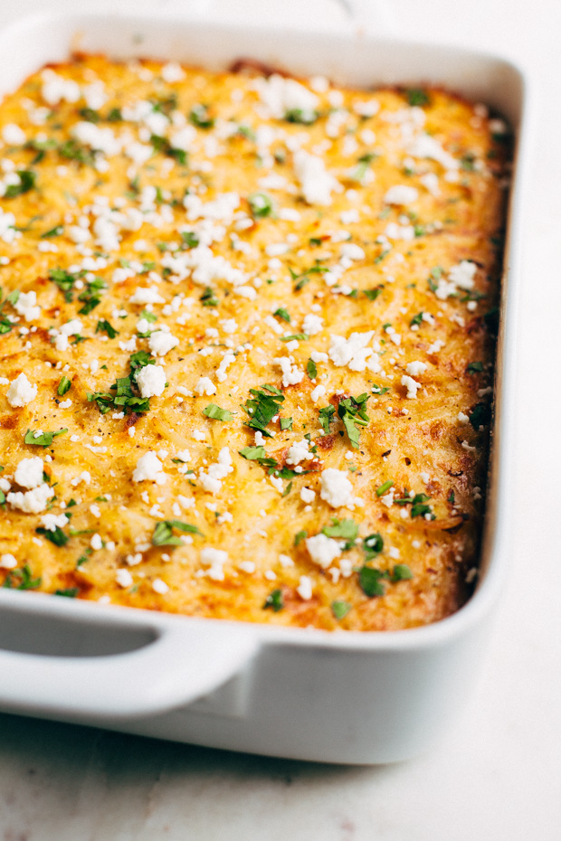 Mexican Breakfast Casserole with Hash Brown Crust - an easy casserole that feeds a crowd! You can even stuff it inside warm tortillas and make breakfast tacos! #breakfastcasserole #mexicanbreakfastcasserole #breakfasttacos | Littlespicejar.com