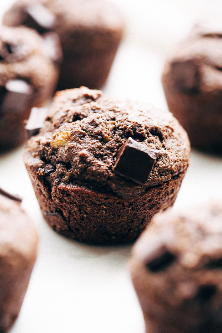 Lighter Double Chocolate Banana Muffins - Easy muffins that are made with whole wheat flour, mashed bananas, and contain NO BUTTER! #doublechocolatemuffins #chocolatemuffins #bananachocolatechipmuffins #muffins | Littlespicejar.com