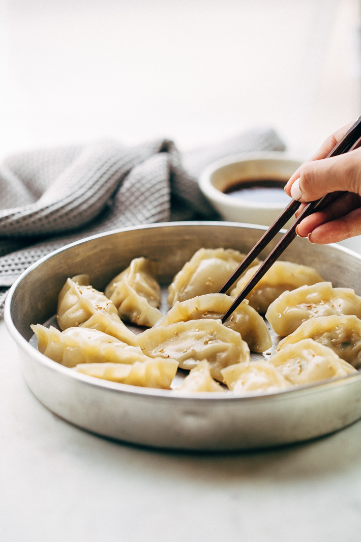 Crazy Good Potstickers with 3-Ingredient Dipping Sauce - The perfect potstickers to make with friends, family, or your significant other on a weekend. The filling is quick and easy to make and these potstickers are so very good! #potstickers #gyoza #jiaozi #wonton | Littlespicejar.com